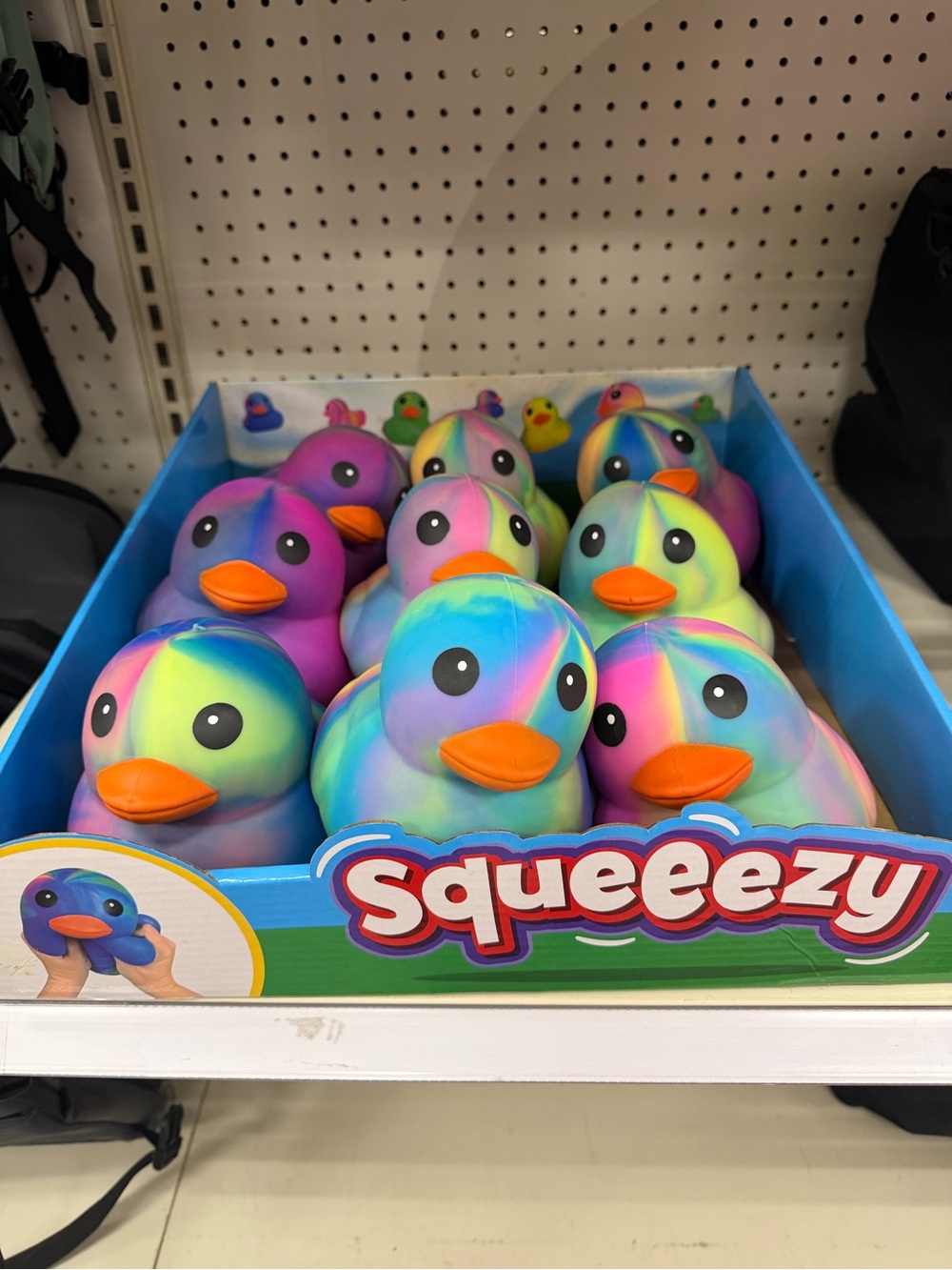 Squeezy tie dye duck in hand and ships next day- you receive a random one